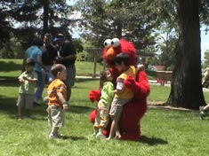 Rent birthday party characters Sesame Street Elmo Cookie Monster Big Bird childrens parties mascots