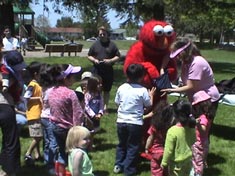 Sesame Street Elmo kids party costume characters for hire san jose los angeles orange county san francisco