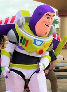 Colorful adult mascot costume characters used for kids party entertainment and promotional events, representing popular themed characters for birthday parties and community celebrations.