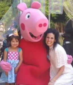 Professional Peppa Pig adult mascot costume for birthday parties, photos, and memorable character appearances.