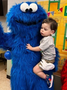 Cookie Monster mascot costume rental for kids' parties, events, and photo appearances.