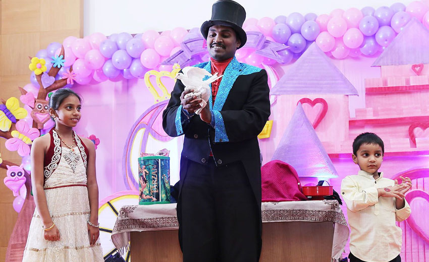 Parent using a kids birthday party checklist to plan a successful birthday celebration