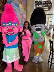 Rent a Poppy adult-size mascot costume from Trolls for kids' birthday parties and special occasions.