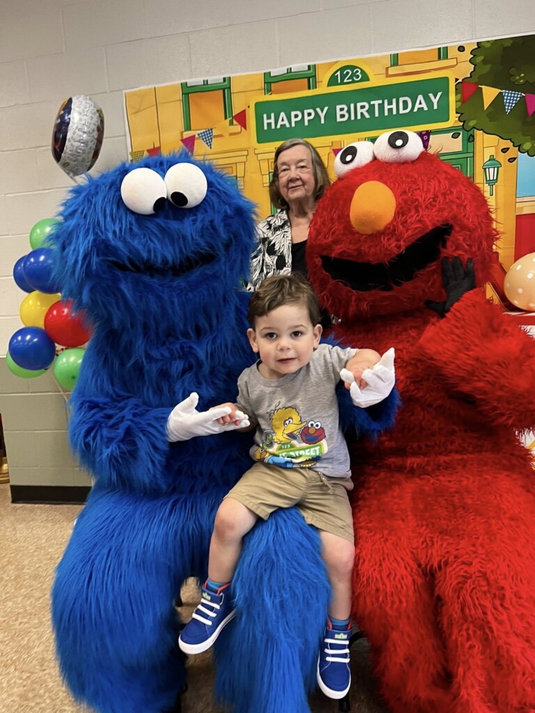 Sesame Street Elmo mascot costume rental for kids birthday parties, preschool events, and children's celebrations