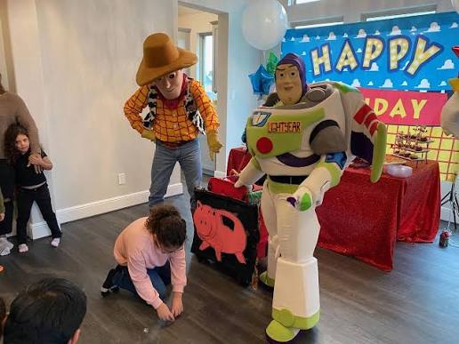 Toy Story adult mascot costume rental featuring Buzz Lightyear and Woody characters for birthday parties and events
